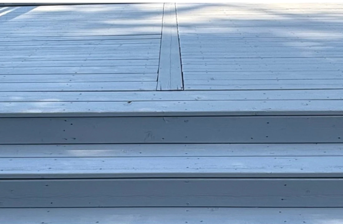 Restored and refinished deck with steps